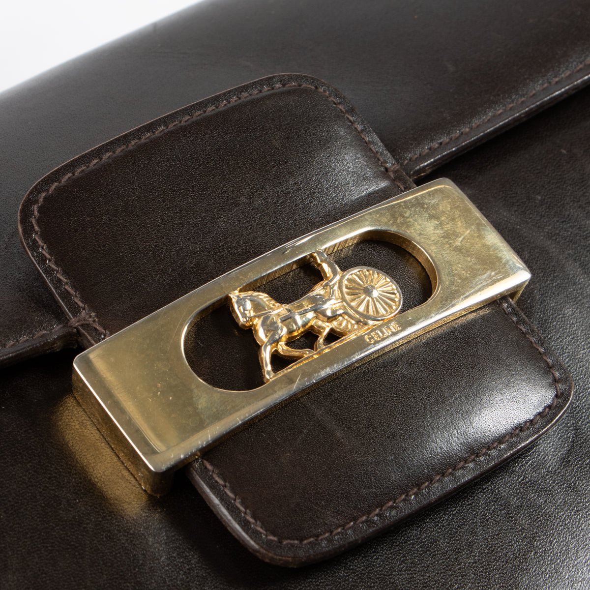 Shop the 100% authentic Celine Vintage Dark Brown Shiny Calfskin Carriage Shoulder Bag second hand on Labellov.com!