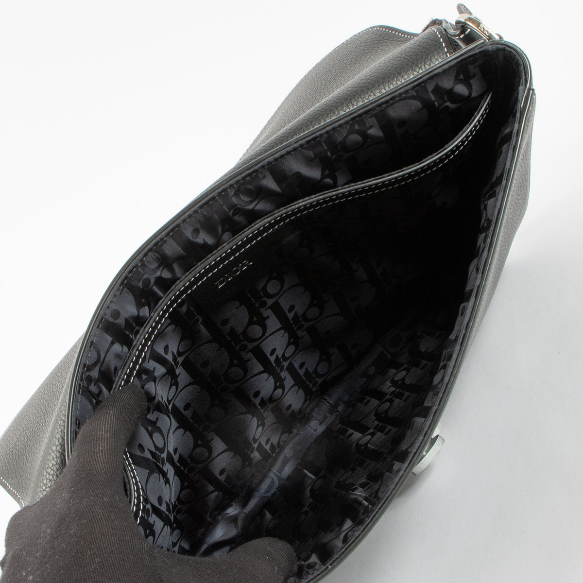 shop this authentic Christian Dior Black Leather Saddle Clutch pre-loved on Labellov.com