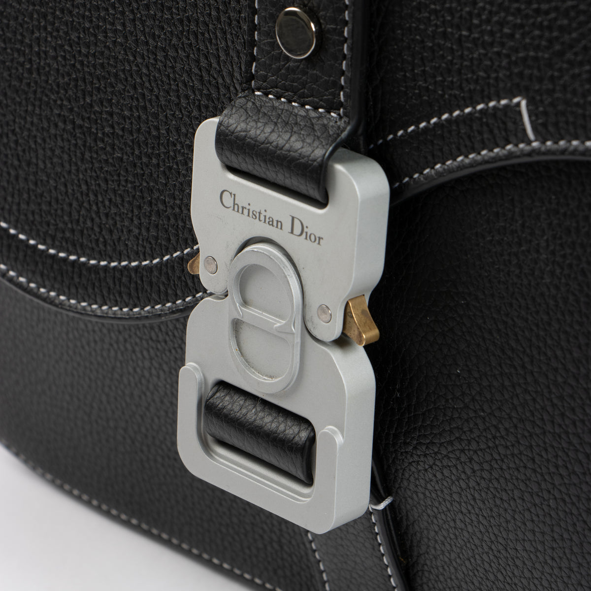 shop this authentic Christian Dior Black Leather Saddle Clutch pre-loved on Labellov.com