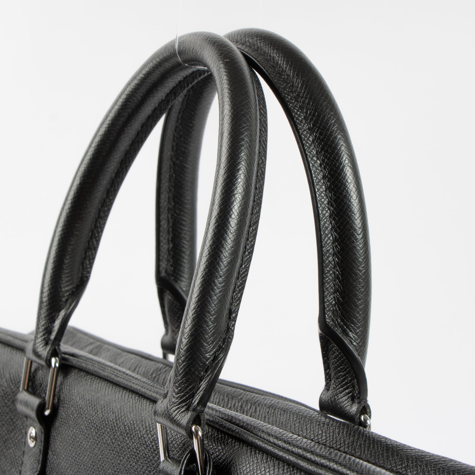 Shop this authentic Louis Vuitton Black Taiga Porte Document Voyage PM pre-loved on Labellov.com