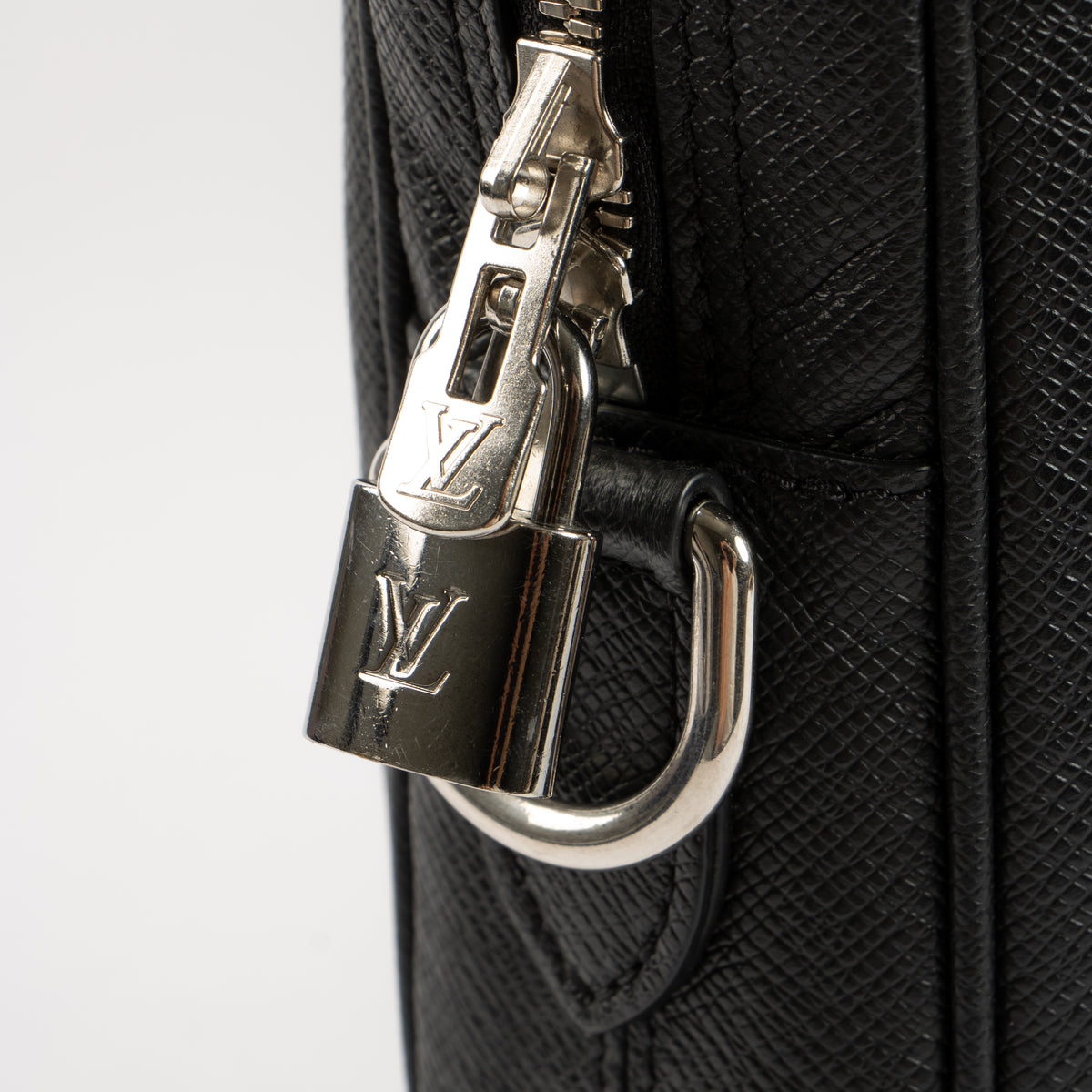 Shop this authentic Louis Vuitton Black Taiga Porte Document Voyage PM pre-loved on Labellov.com