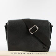 Shop the authentic Louis Vuitton Black Taiga District PM Messenger Bag second hand on Labellov.com!
