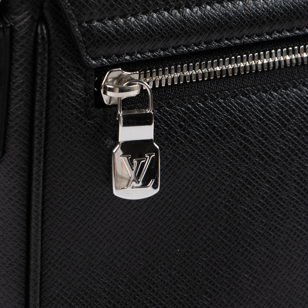 Shop the authentic Louis Vuitton Black Taiga District PM Messenger Bag second hand on Labellov.com!