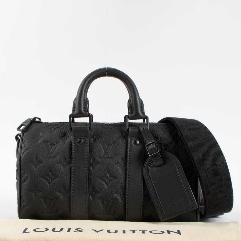Shop this authentic Louis Vuitton Black Monogram Empreinte Keepall Bandouliere 20 pre-loved on Labellov.com