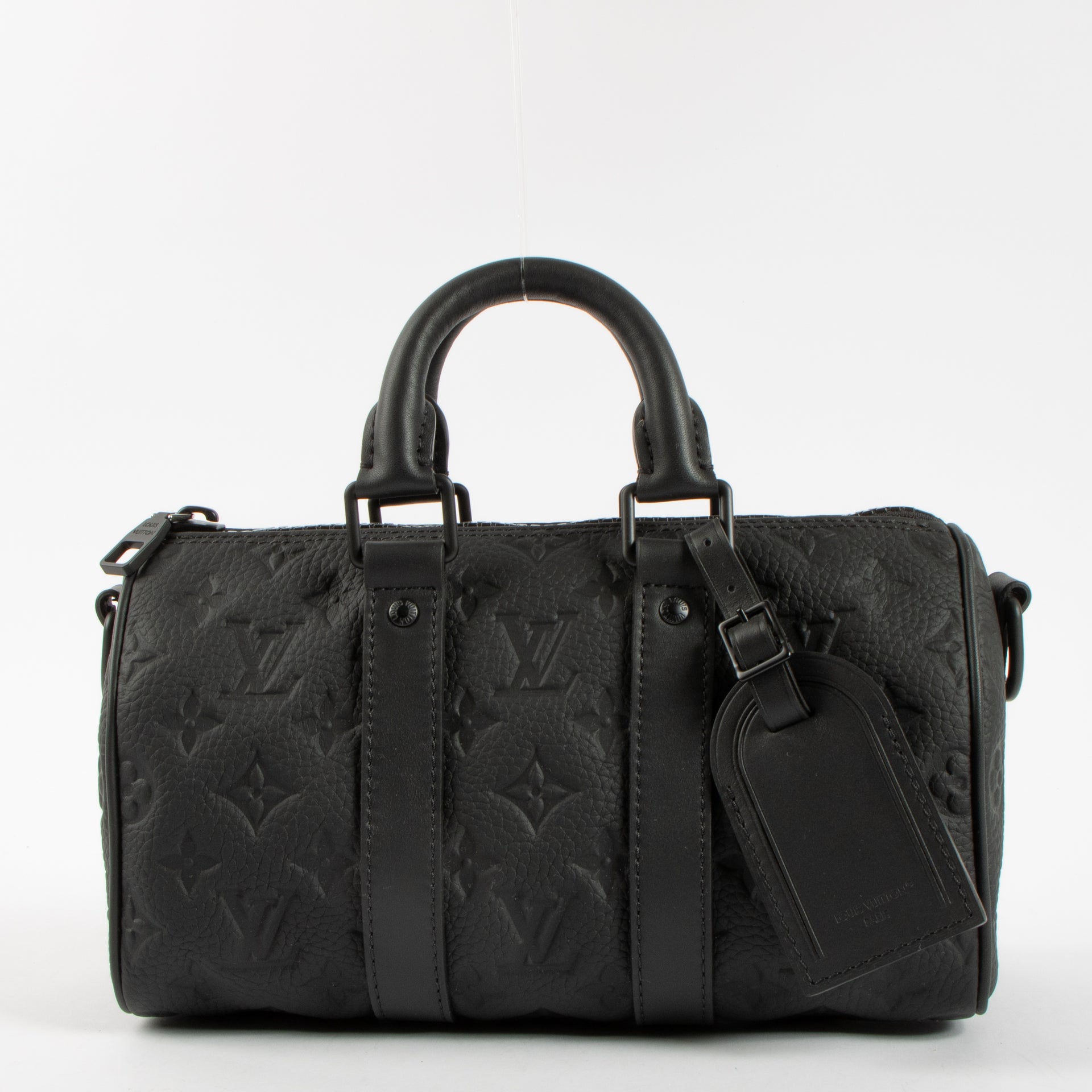 Shop this authentic Louis Vuitton Black Monogram Empreinte Keepall Bandouliere 20 pre-loved on Labellov.com