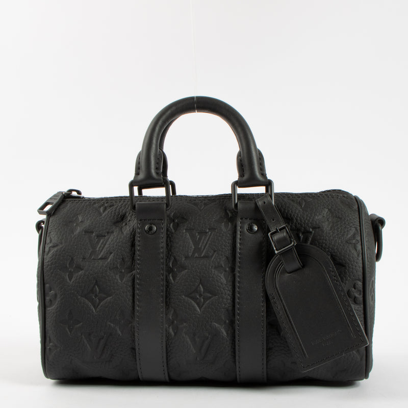 Shop this authentic Louis Vuitton Black Monogram Empreinte Keepall Bandouliere 20 pre-loved on Labellov.com
