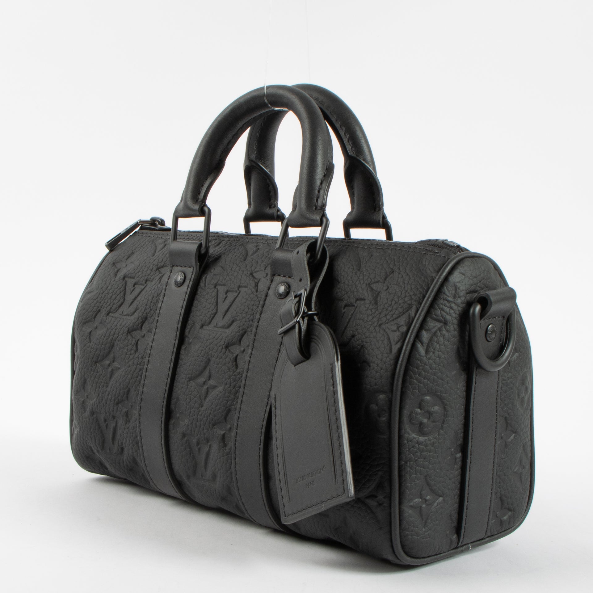 Shop this authentic Louis Vuitton Black Monogram Empreinte Keepall Bandouliere 20 pre-loved on Labellov.com