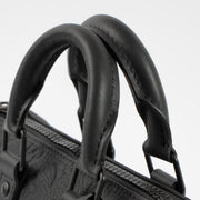 Shop this authentic Louis Vuitton Black Monogram Empreinte Keepall Bandouliere 20 pre-loved on Labellov.com