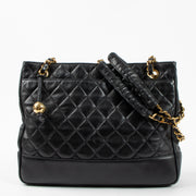 Shop the authentic Chanel Vintage Black Lambskin Ball Charm Tote Bag second hand on Labellov.com!