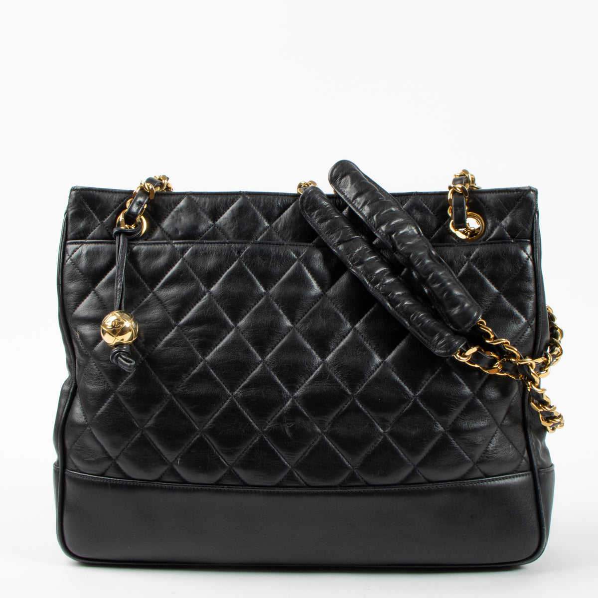 Shop the authentic Chanel Vintage Black Lambskin Ball Charm Tote Bag second hand on Labellov.com!