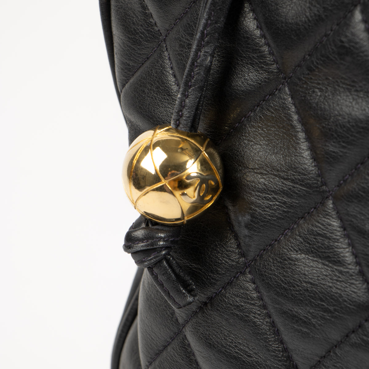 Shop the authentic Chanel Vintage Black Lambskin Ball Charm Tote Bag second hand on Labellov.com!