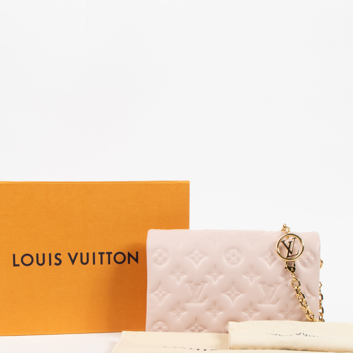louis Vuitton Pink Monogram Embossed Pochette Coussin Bag