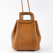 Shop this authentic Delvaux Fauve Trotteur Punch Bag pre-loved on labellov.com