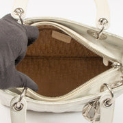 Shop this authentic Dior White Leather Medium Lady Dior Bag pre-loved on Labellov.com