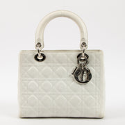 Shop this authentic Dior White Leather Medium Lady Dior Bag pre-loved on Labellov.com