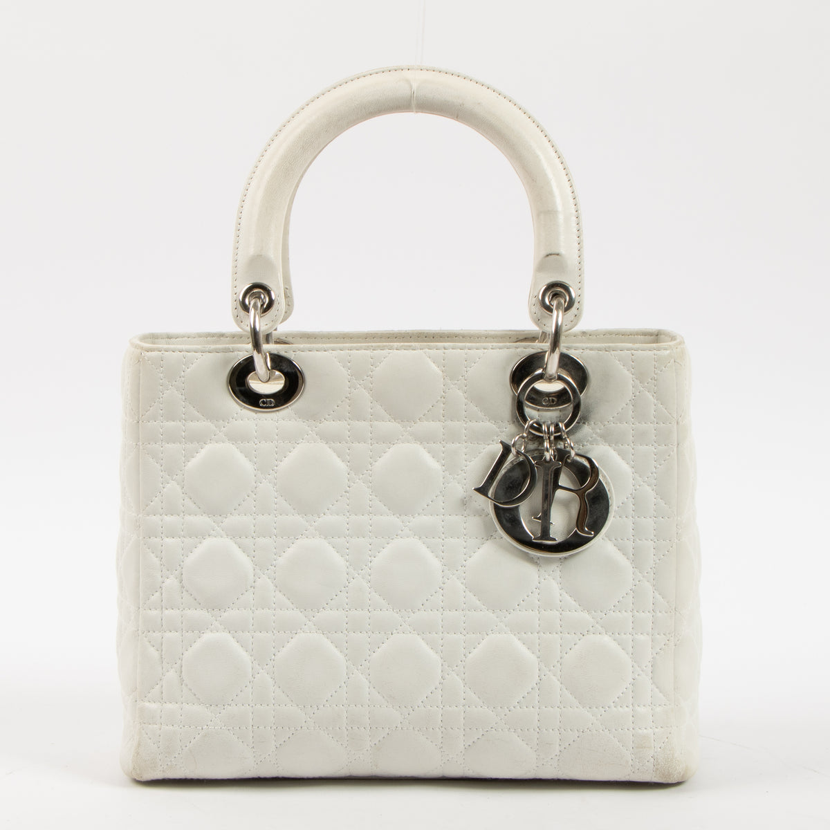 Shop this authentic Dior White Leather Medium Lady Dior Bag pre-loved on Labellov.com