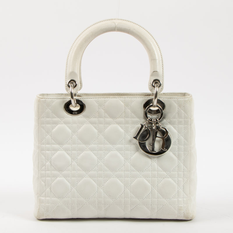 Shop this authentic Dior White Leather Medium Lady Dior Bag pre-loved on Labellov.com