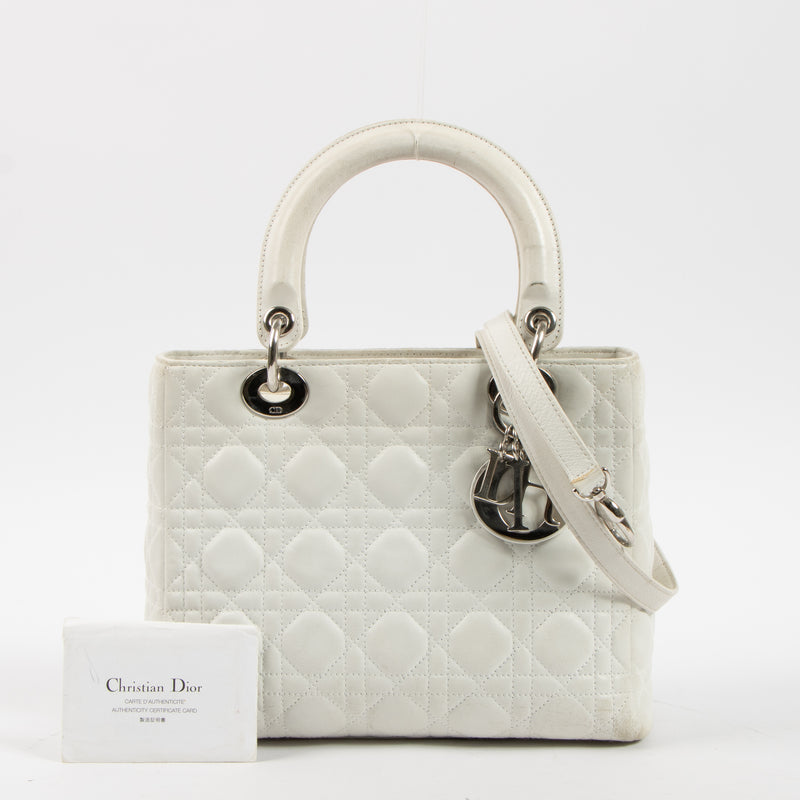 Shop this authentic Dior White Leather Medium Lady Dior Bag pre-loved on Labellov.com