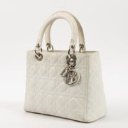 Shop this authentic Dior White Leather Medium Lady Dior Bag pre-loved on Labellov.com