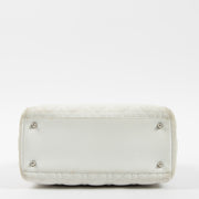 Shop this authentic Dior White Leather Medium Lady Dior Bag pre-loved on Labellov.com