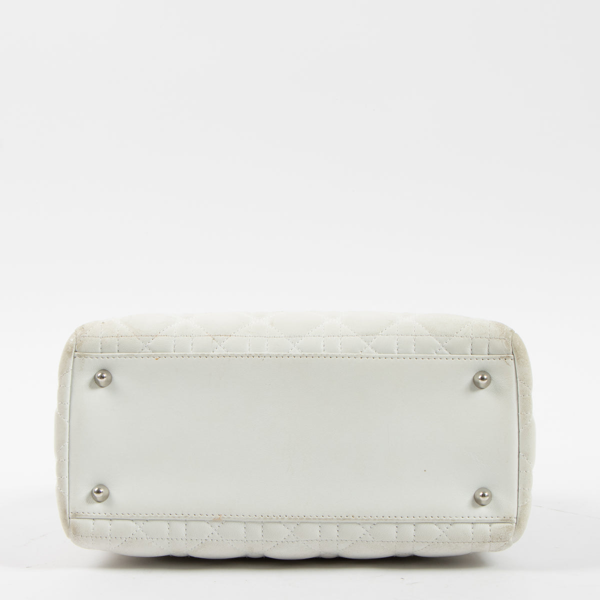 Shop this authentic Dior White Leather Medium Lady Dior Bag pre-loved on Labellov.com