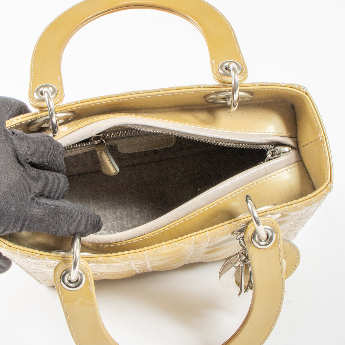 Shop this authentic Dior Beige Patent Leather Medium Lady Dior Bag pre-loved on Labellov.com