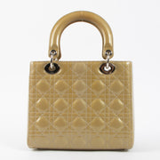 Shop this authentic Dior Beige Patent Leather Medium Lady Dior Bag pre-loved on Labellov.com