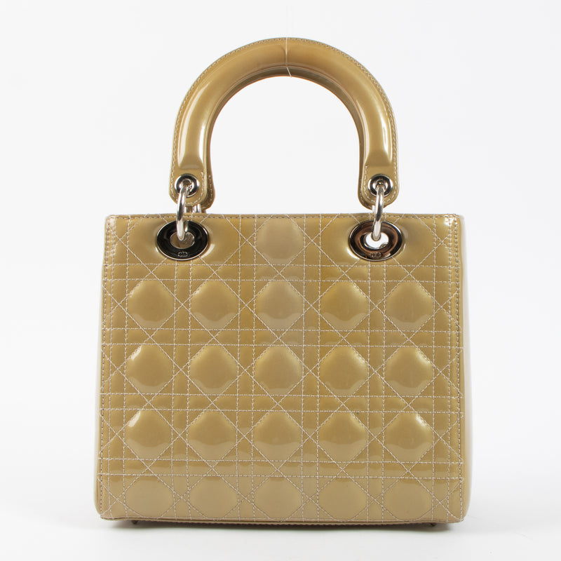 Shop this authentic Dior Beige Patent Leather Medium Lady Dior Bag pre-loved on Labellov.com