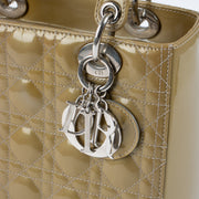 Shop this authentic Dior Beige Patent Leather Medium Lady Dior Bag pre-loved on Labellov.com
