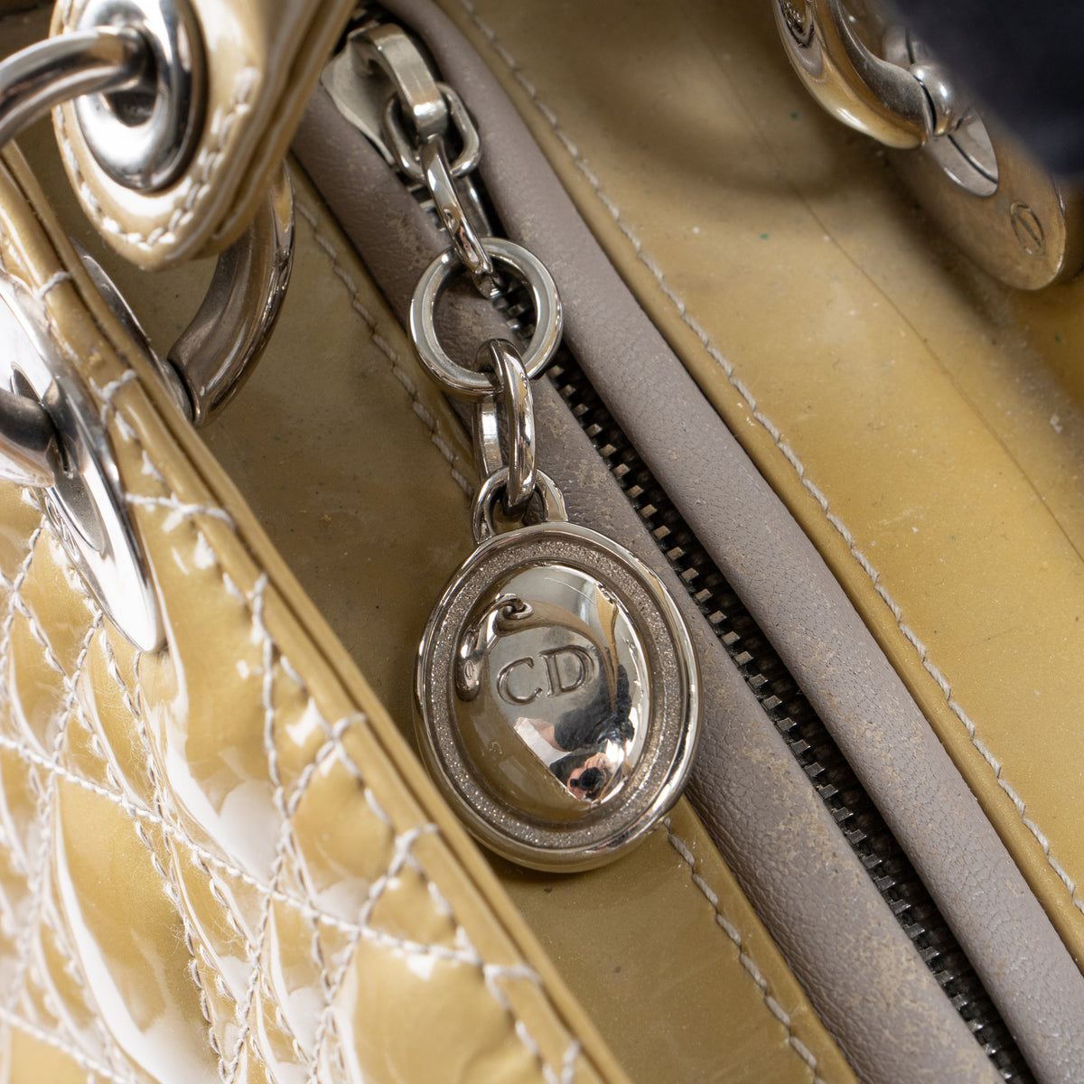 Shop this authentic Dior Beige Patent Leather Medium Lady Dior Bag pre-loved on Labellov.com