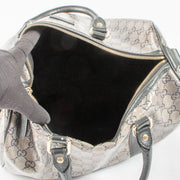 Shop this authentic luxury Gucci Black GG Crystal Medium Joy Boston Bag pre-loved on Labellov.com