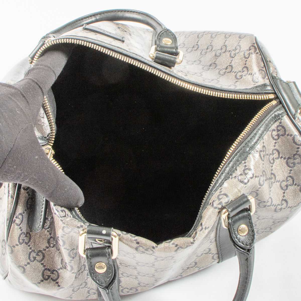Shop this authentic luxury Gucci Black GG Crystal Medium Joy Boston Bag pre-loved on Labellov.com