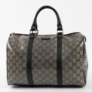 Shop this authentic luxury Gucci Black GG Crystal Medium Joy Boston Bag pre-loved on Labellov.com