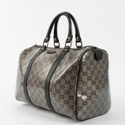 Shop this authentic luxury Gucci Black GG Crystal Medium Joy Boston Bag pre-loved on Labellov.com