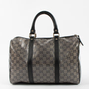 Shop this authentic luxury Gucci Black GG Crystal Medium Joy Boston Bag pre-loved on Labellov.com