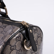 Shop this authentic luxury Gucci Black GG Crystal Medium Joy Boston Bag pre-loved on Labellov.com