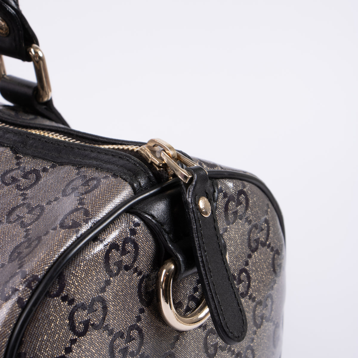 Shop this authentic luxury Gucci Black GG Crystal Medium Joy Boston Bag pre-loved on Labellov.com