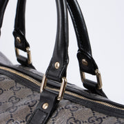 Shop this authentic luxury Gucci Black GG Crystal Medium Joy Boston Bag pre-loved on Labellov.com