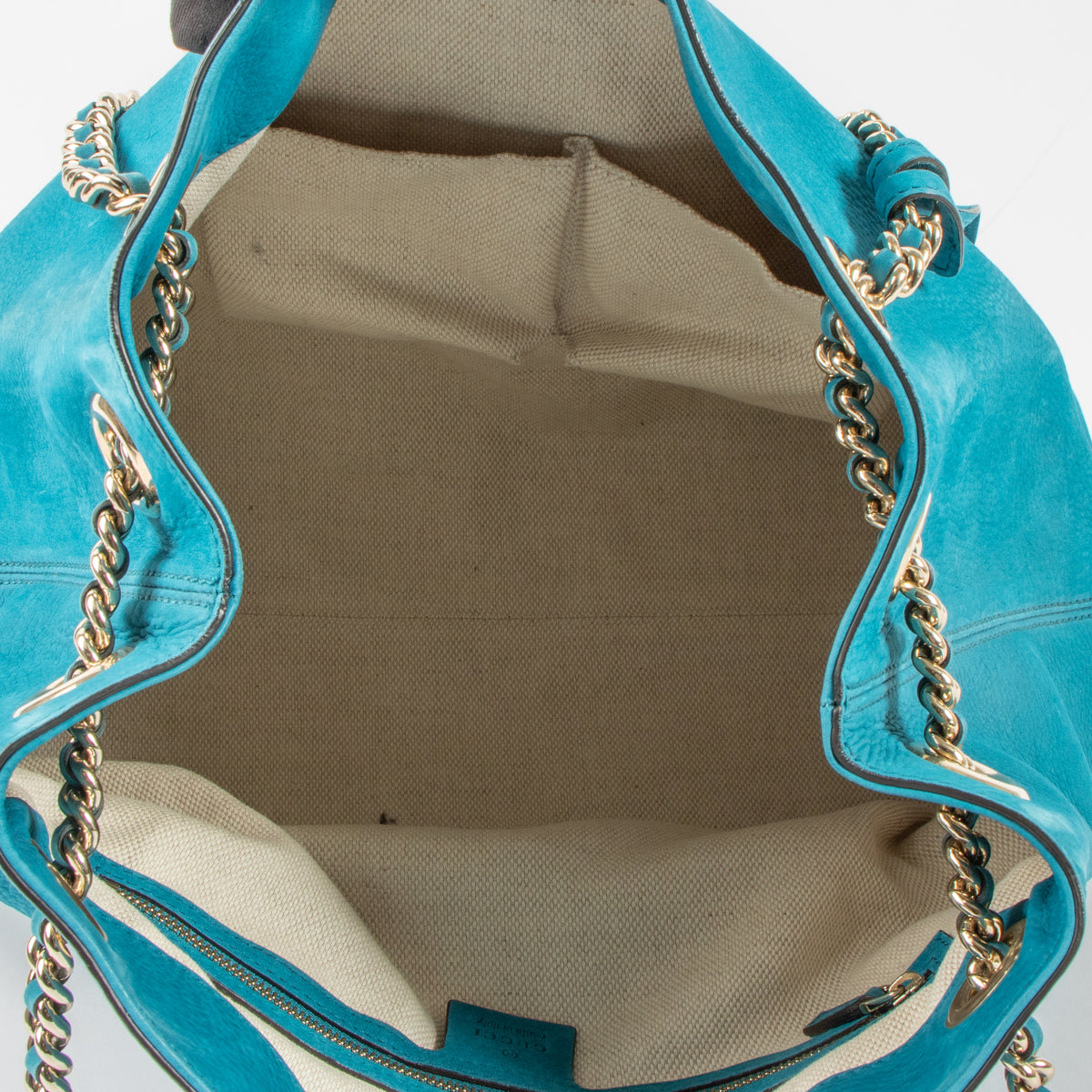 Shop this authentic luxury Gucci Turquoise Suede Soho Hobo Bag pre-loved on labellov.com