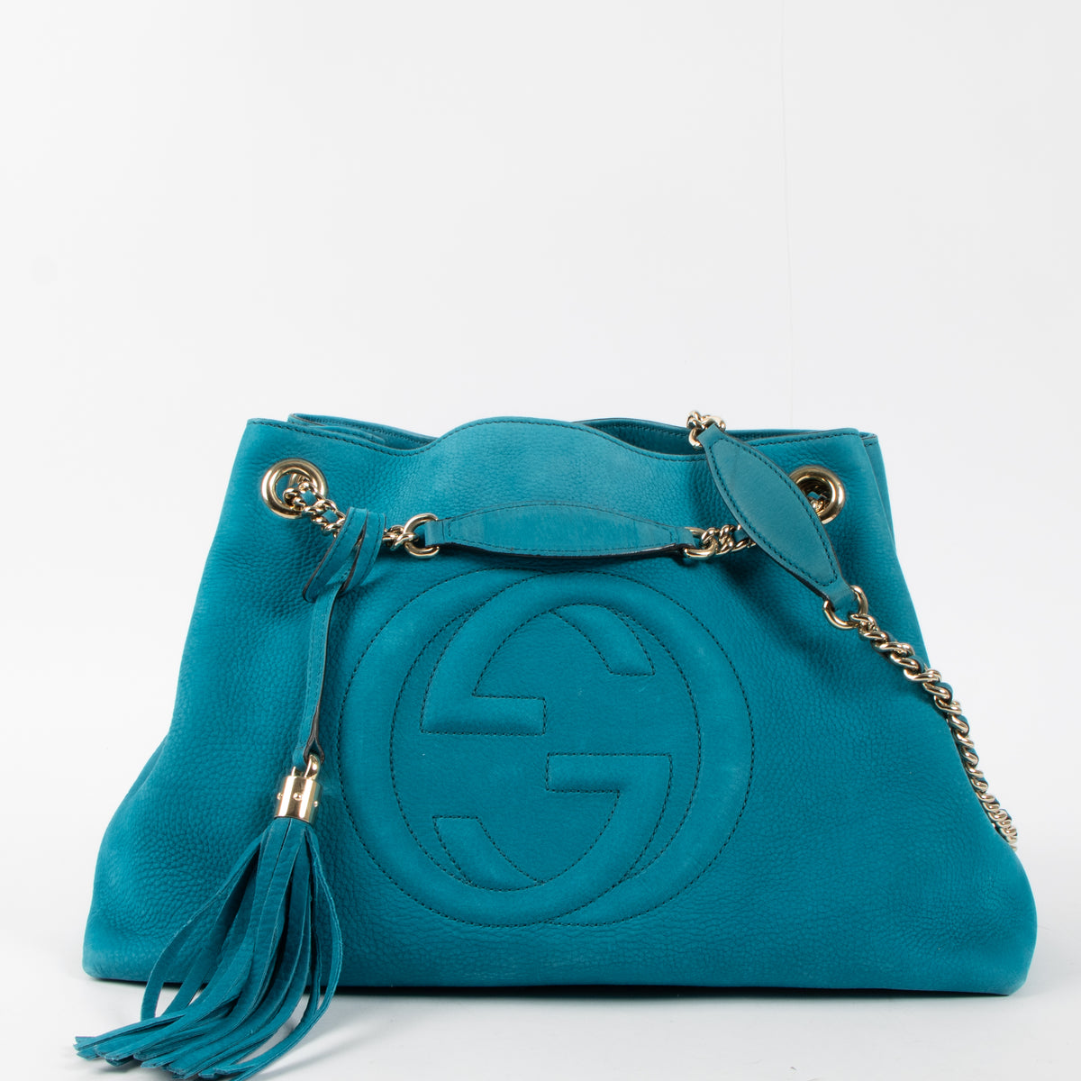 Shop this authentic luxury Gucci Turquoise Suede Soho Hobo Bag pre-loved on labellov.com