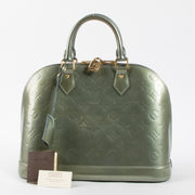 Shop this authentic luxury Louis Vuitton Gris Art Deco Monogram Vernis Alma PM Bag pre-loved on Labellov.com