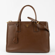Shop this authentic luxury Prada Brown Saffiano Large Galleria bag pre-loved on Labellov.com