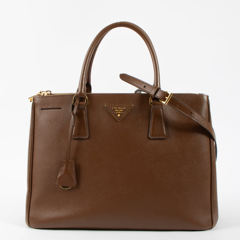 Shop this authentic luxury Prada Brown Saffiano Large Galleria bag pre-loved on Labellov.com