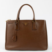 Shop this authentic luxury Prada Brown Saffiano Large Galleria bag pre-loved on Labellov.com