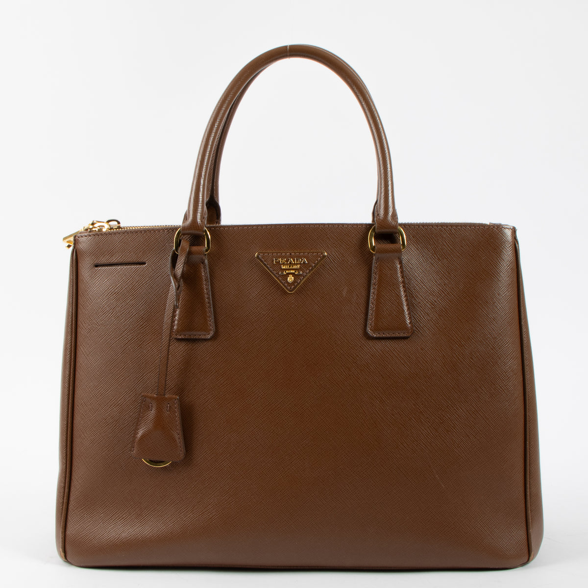 Shop this authentic luxury Prada Brown Saffiano Large Galleria bag pre-loved on Labellov.com