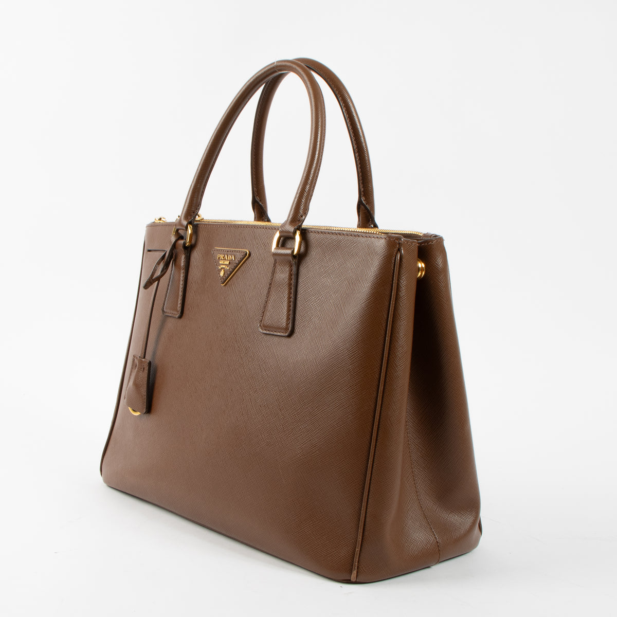 Shop this authentic luxury Prada Brown Saffiano Large Galleria bag pre-loved on Labellov.com