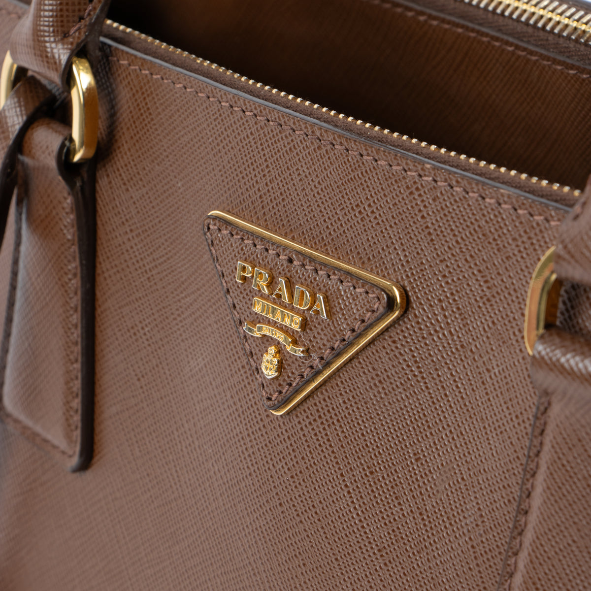 Shop this authentic luxury Prada Brown Saffiano Large Galleria bag pre-loved on Labellov.com