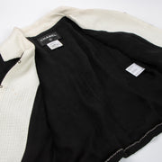 Shop this authentic luxury chanel 09P black Tweed Jacket/Skirt/Trousers Set pre-loved by Labellov.com