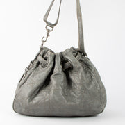 Shop this authentic Christian Dior silver Top handle pre-loved on Labellov