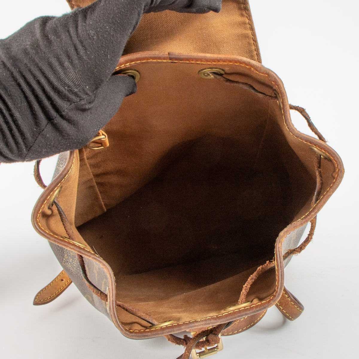 Shop this authentic Louis Vuitton monogram Montsouris Backpack pre-loved on Labellov.com.